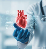 doctor-presenting-3d-heart-model-with-digital-interface