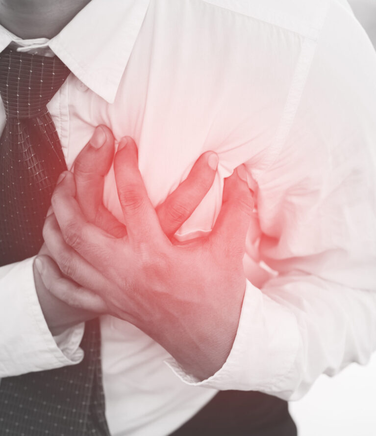 Man having chest pain - heart attack outdoors. or Heavy exercise causes the body to shocks heart disease.